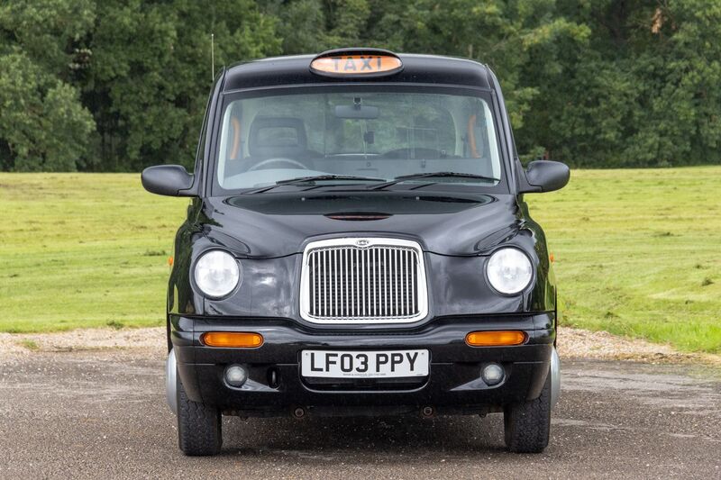 LONDON TAXIS INTERNATIONAL TXII London Taxis International TX2 Gold Taxicab 2003