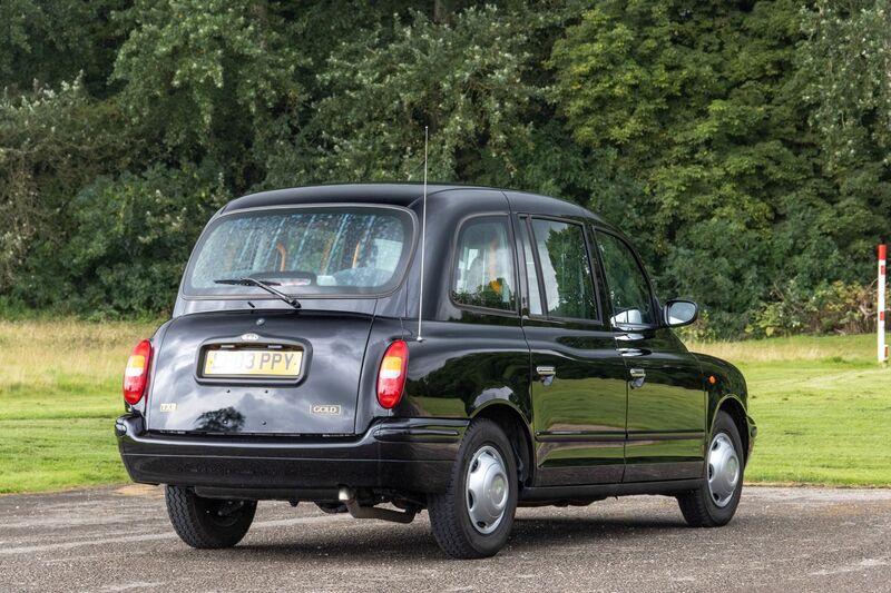 LONDON TAXIS INTERNATIONAL TXII London Taxis International TX2 Gold Taxicab 2003