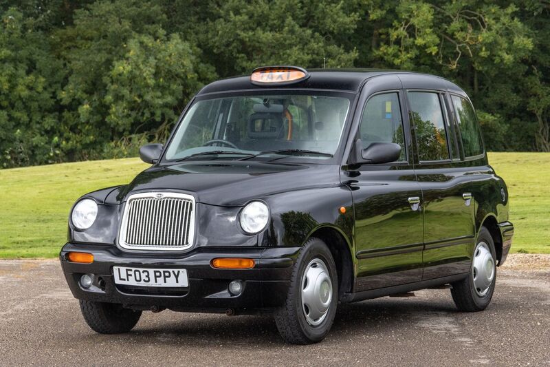 LONDON TAXIS INTERNATIONAL TXII London Taxis International TX2 Gold Taxicab 2003