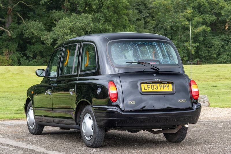 LONDON TAXIS INTERNATIONAL TXII London Taxis International TX2 Gold Taxicab 2003