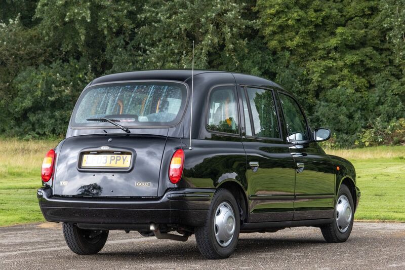 LONDON TAXIS INTERNATIONAL TXII London Taxis International TX2 Gold Taxicab 2003